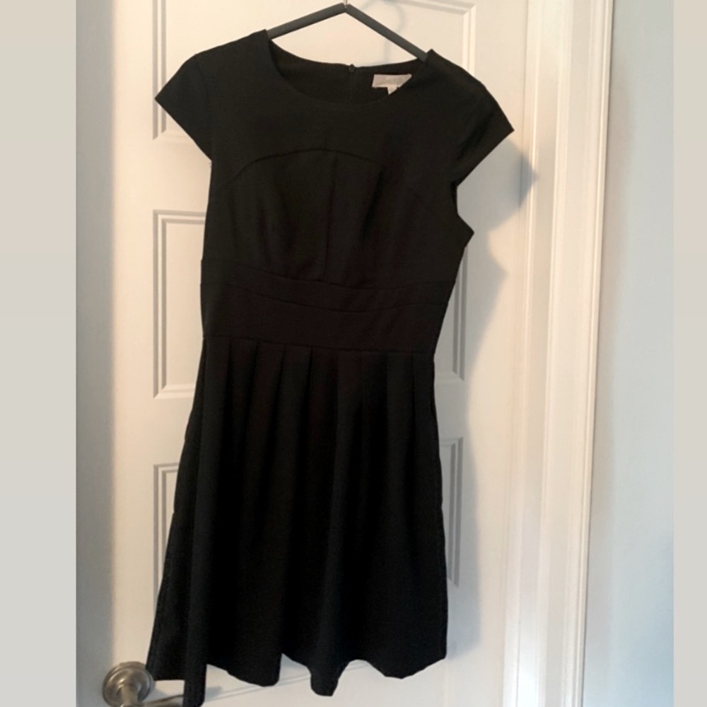 Black boutique peplum mini dress